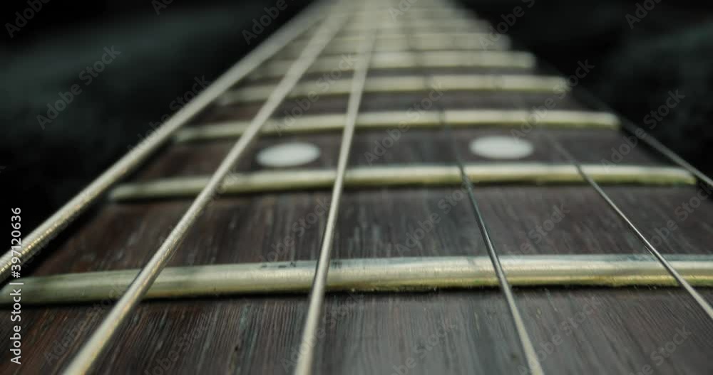 Electric guitar fretboard macro closeup slider shot Electric guitar fretboard macro closeup slider shot