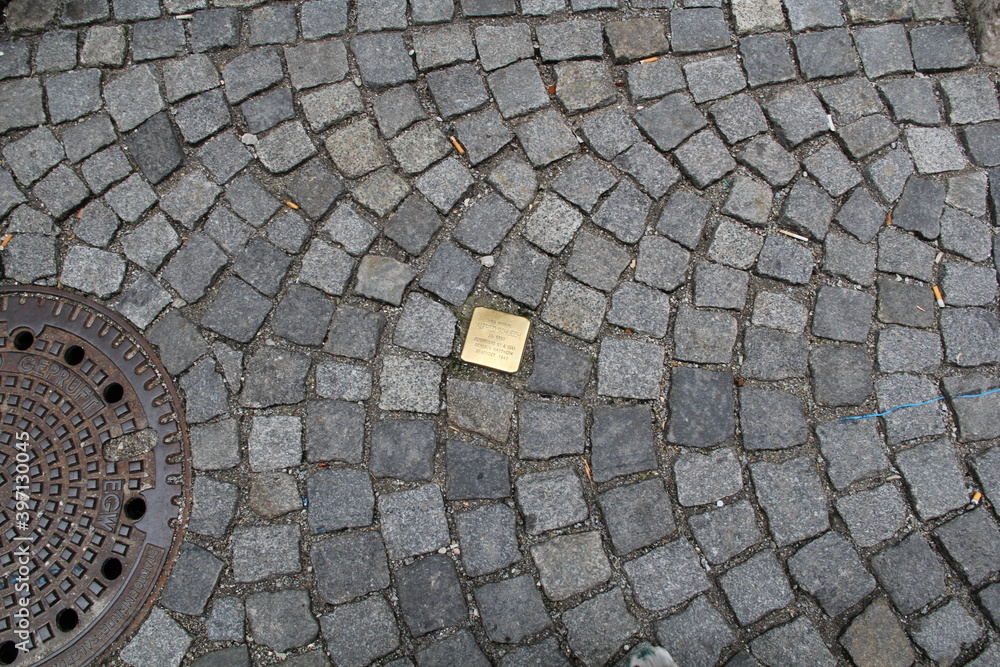 gold insert in paving stones on the street gold insert in paving stones on the street