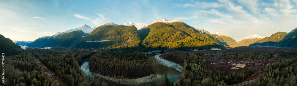 Beautiful Aerial Panoramic View of Canadian Mountain Landscape during a Sunny Sunrise. Taken near Squamish, North of Vancouver, British Columbia, Canada. Nature Background Panorama