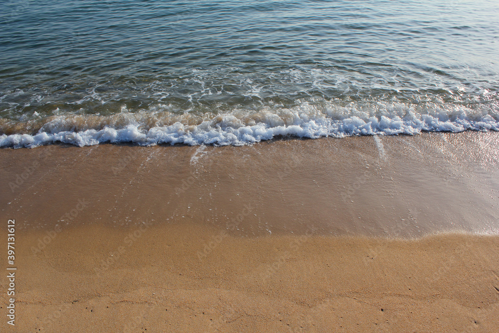 Soft beautiful ocean wave on sandy beach. Background Soft beautiful ocean wave on sandy beach. Background