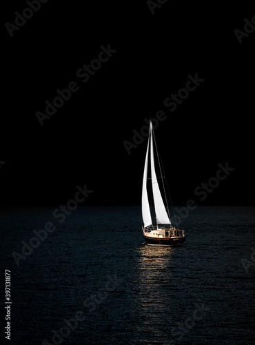 Canvas sailboat on the lake