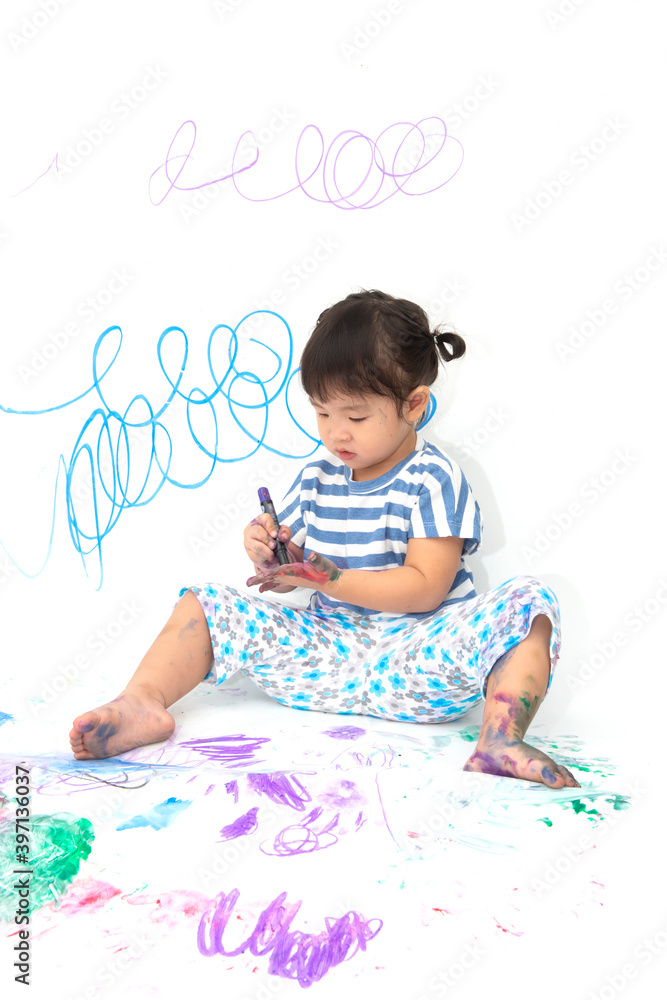 Cute little girl enjoying drawing, painting process Cute little girl enjoying drawing, painting process