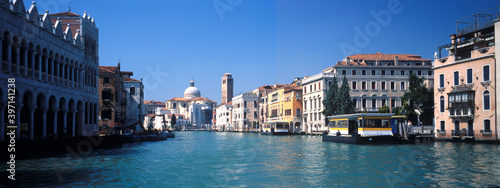 View of Grand Canal and the colorful Venetian houses along the canal in Venice, Italy.