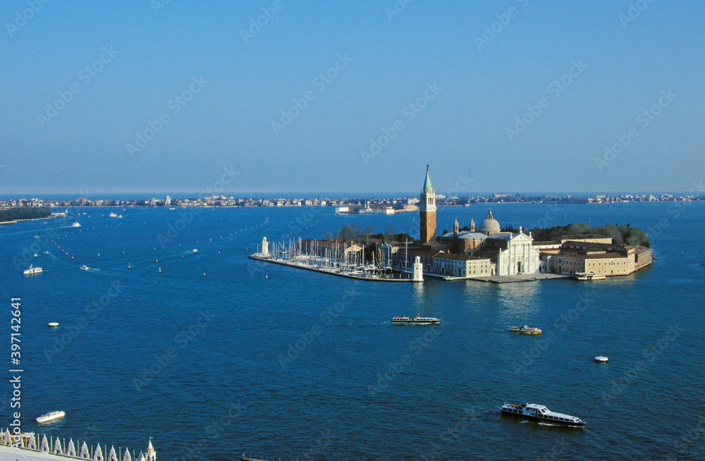 Aerial view of Venice cityscape and San Giorgio Maggiore island seen from St Mark's Campanile at St. Mark's Square in Venice, Italy