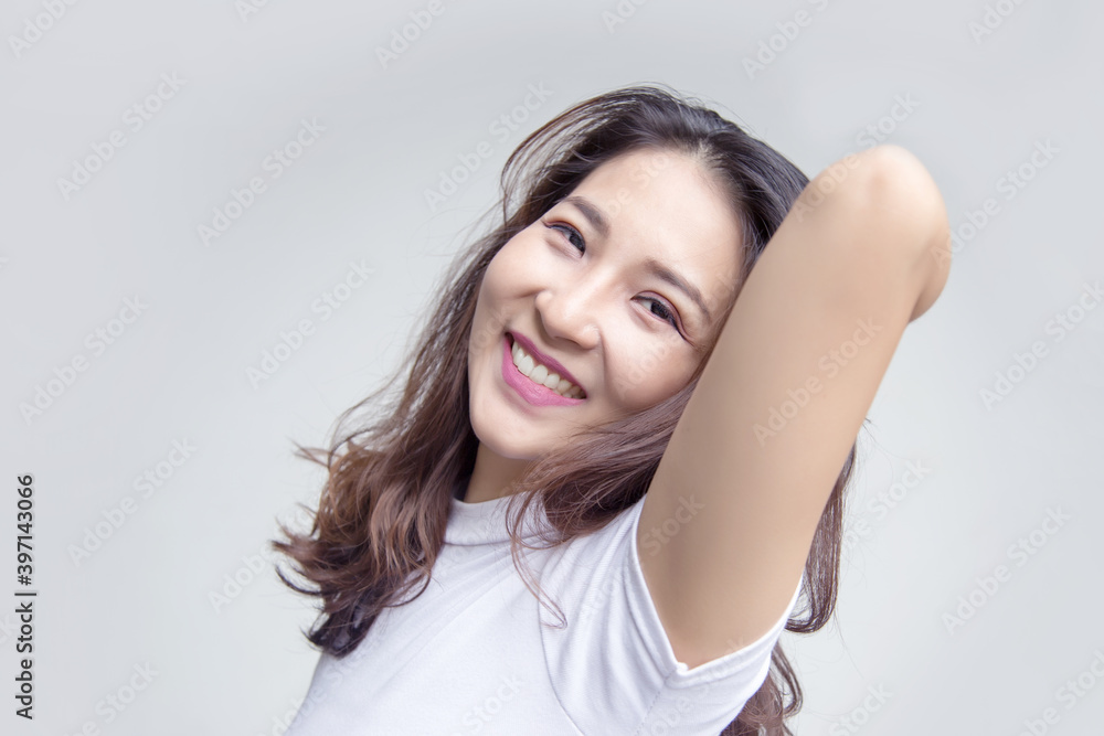 Smiling cheerful cute Asian woman in white casual with open Smiling cheerful cute Asian woman in white casual with open