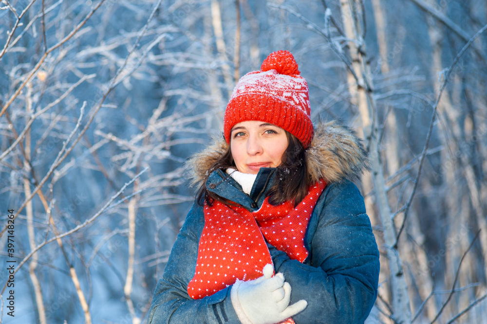 young girl in a winter fairy forest in sunny weather