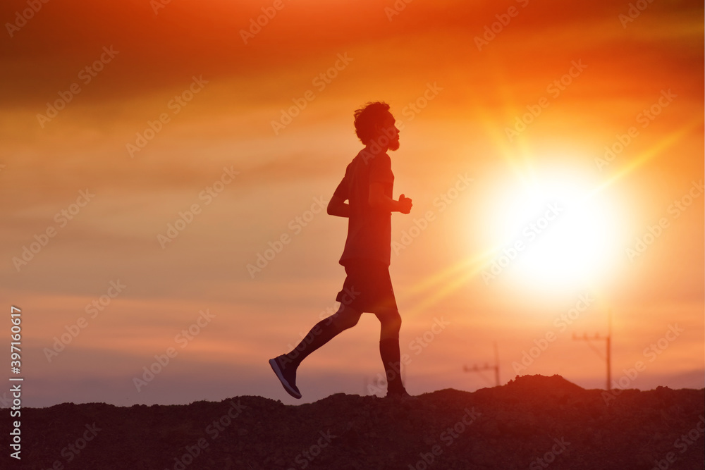 Man running at sunset concept sport healthy lifestyle