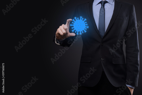 Businessman, man hold in hand abstract virus strain model of COVID-19 respiratory syndrome Coronavirus and Novel coronavirus 2019-nCoV