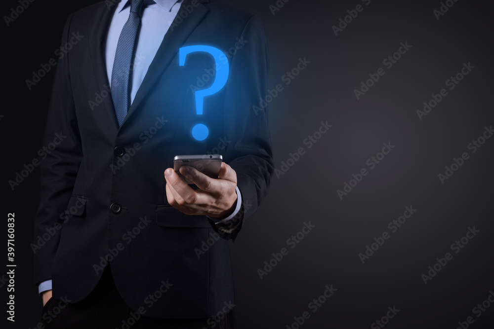 Businessman man hand hold interface question marks sign web. Ask quiestion online, FAQ concept, what where when how and why, search information on internet Businessman man hand hold interface question marks sign web. Ask quiestion online, FAQ concept, what where when how and why, search information on internet