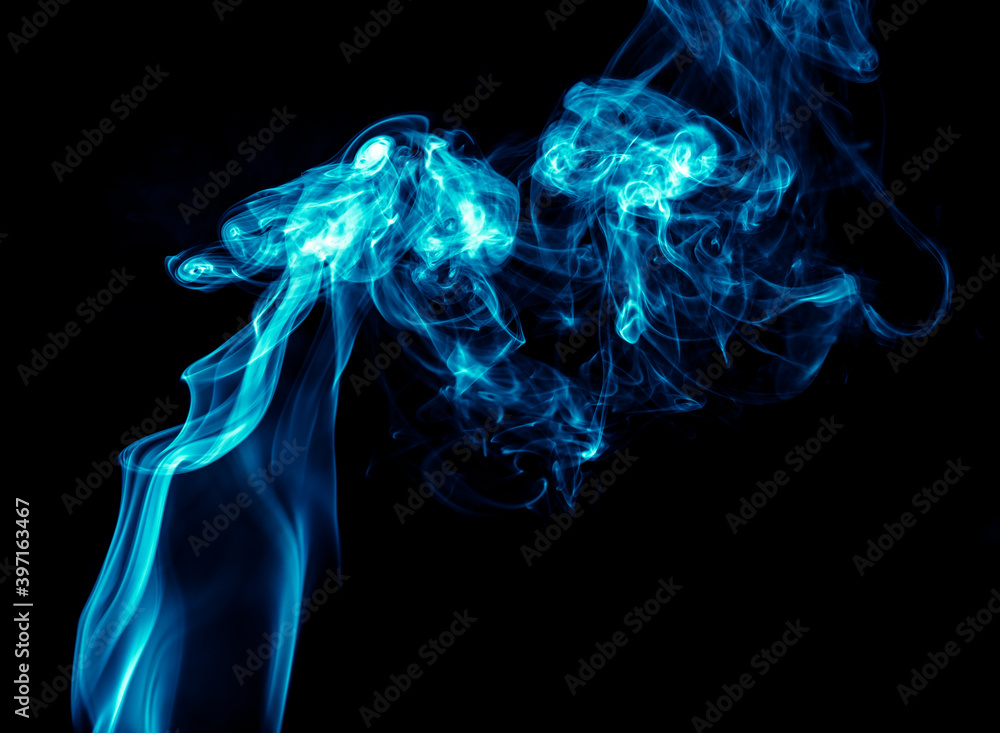 Blue smoke isolated on black background. Blue smoke isolated on black background.