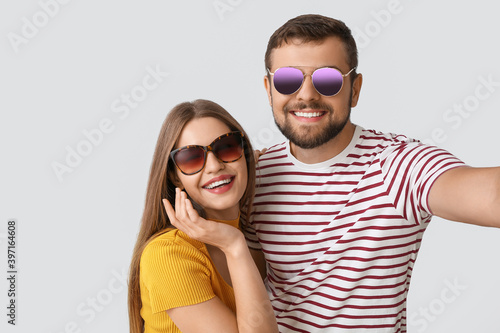 Young couple with stylish s...