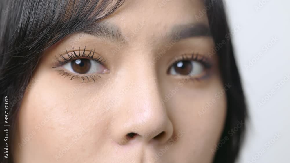Close up The eyes of a beautiful woman. Eyes on the charm of women. 4K Resolution. Close up The eyes of a beautiful woman. Eyes on the charm of women. 4K Resolution.