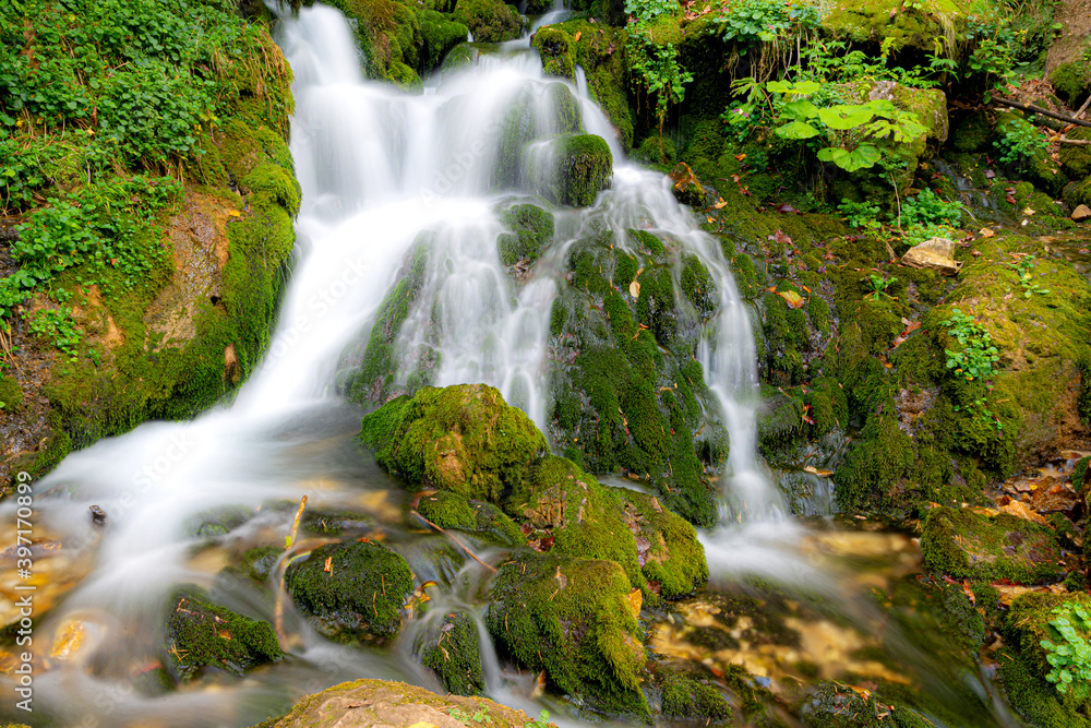 Fototapeta premium Beautiful scenic landscape of Isichenko waterfall in Kurdzhips Gorge in Caucasus mountains by Mezmai at summer, Russia