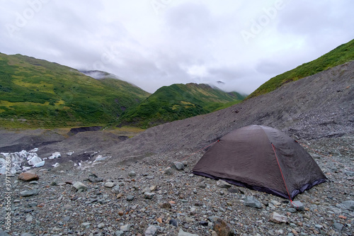 a tent on the glacier. adventure in an abandoned place in Alaska far from civilization.