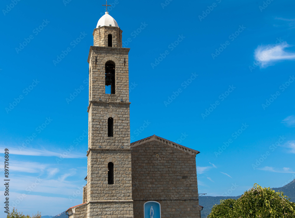 View of the church and bell tower of Our Lady of Church of Eglise Notre Dame Misericorde, Corsica France