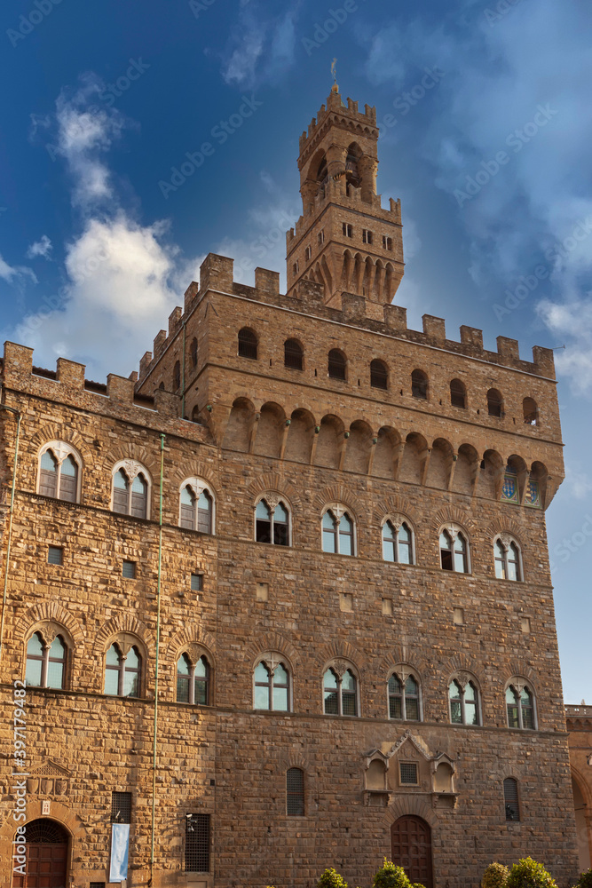 Palazzo VecOchio and clock tower in Signoria square in Florence Italy
