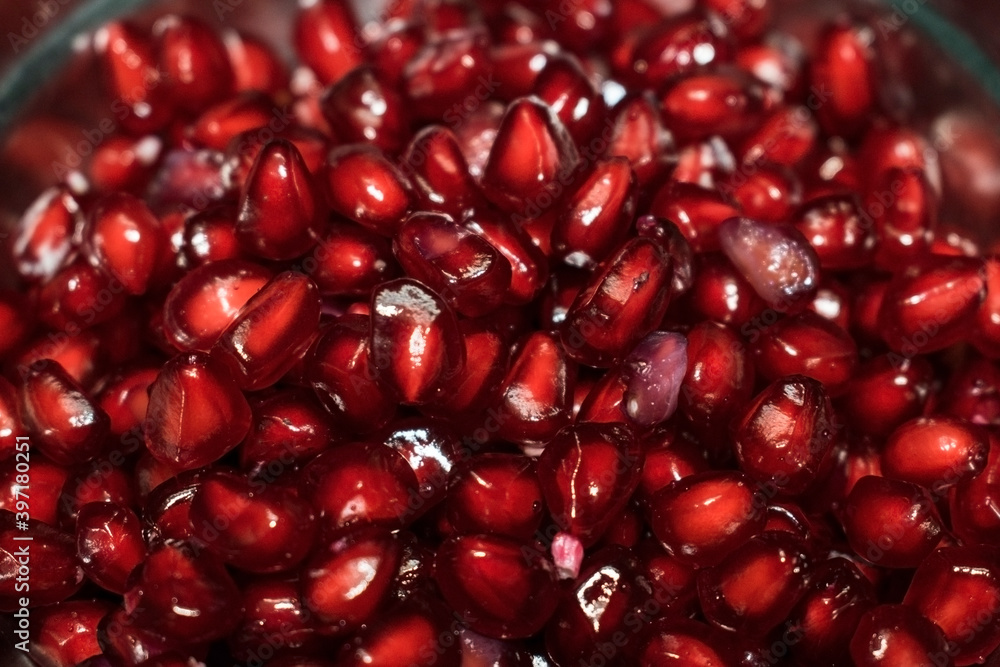 Juicy red and fresh pomegranate fruits with white seeds Juicy red and fresh pomegranate fruits with white seeds