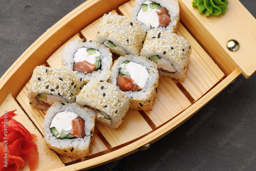 Japanese sushi roll on plate close up Japanese sushi roll on plate close up