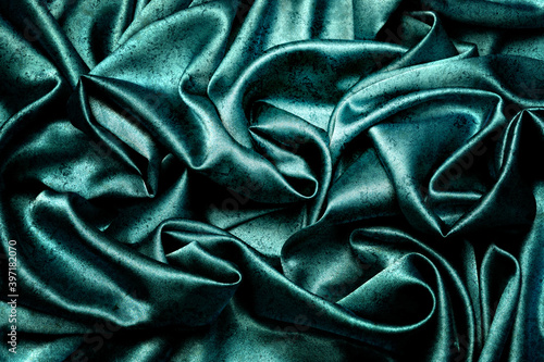 Turquoise silk fabric with marble texture. Background abstract texture