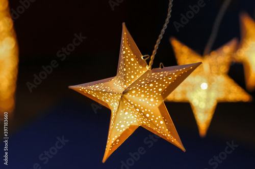 decorations for the holiday. white paper stars.background for Christmas and new year holidays.