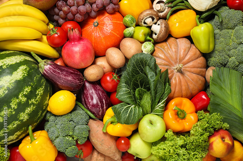 Assortment of organic fresh fruits and vegetables as background  closeup