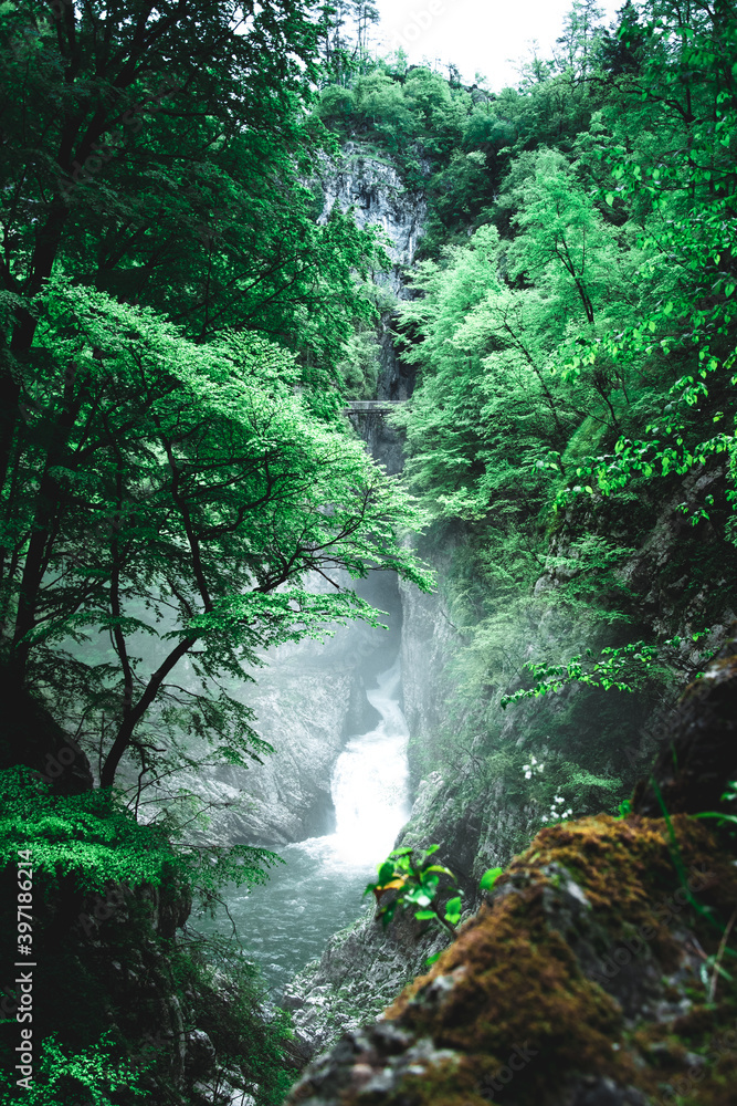 Viewpoint in the cave. Beautiful waterfall and the Reka River. Skocjan Caves in Slovenia. Viewpoint in the cave. Beautiful waterfall and the Reka River. Skocjan Caves in Slovenia.