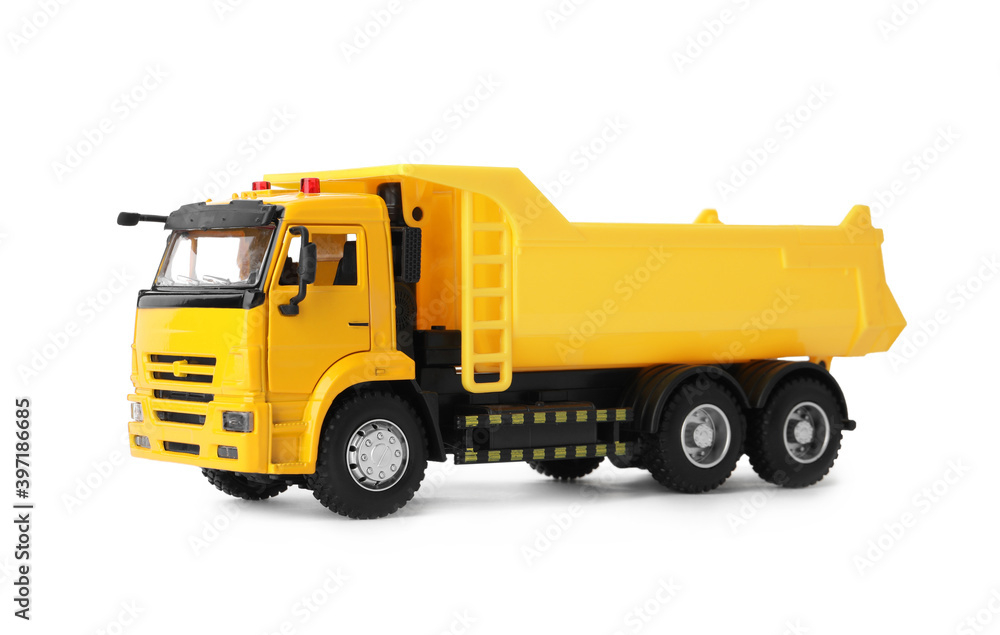 Yellow toy tipper truck isolated on white Yellow toy tipper truck isolated on white