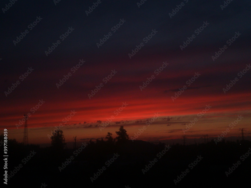 Obraz premium time lapse sunset over the city