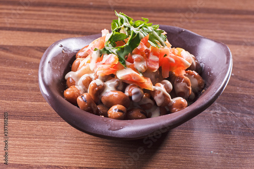 foul or ful Modammas Fava Beans Traditional Dish of Beans for all arab - White background 
