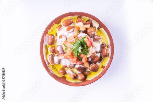 foul or ful Modammas Fava Beans Traditional Dish of Beans for all arab - White background 
 photo