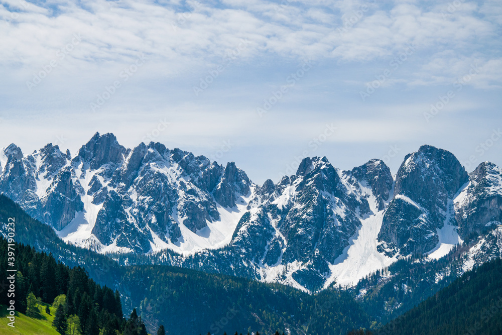 View of the snow-capped peaks of the mountains. View of the Alps. Austria. 