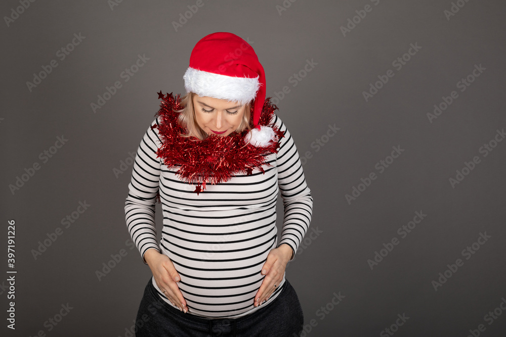 Pregnant woman on Christmas time Pregnant woman on Christmas time