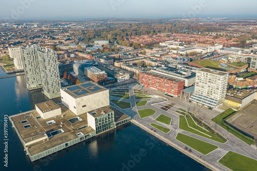 Modern architecture of Almere (Netherlands, suburb of Amsterdam) city center with newly renovated Esplanade square near lake (weerwater). Aerial view.  photo
