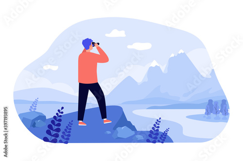 Male explorer standing at cliff, looking at mountains through binoculars. Man enjoying nature and hiking, searching new opportunities. Vector illustration for travel, active lifestyle, goal concept photo