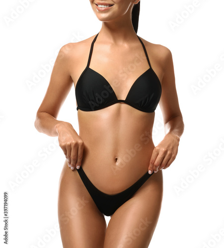 Sexy young woman in stylish swimsuit isolated on white, closeup. Beach body goal