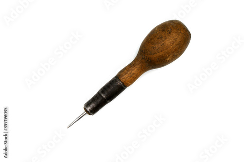 Φωτογραφία awl with wooden handle on white background