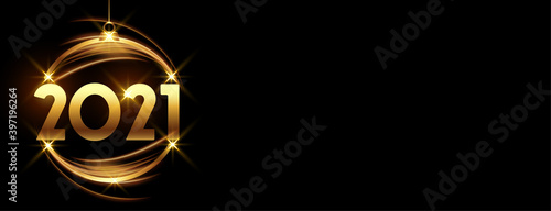 Glowing golden happy new year 2021 bauble on black