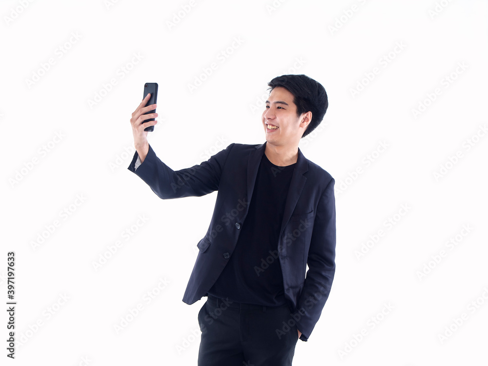 Handsome young man taking a selfie Handsome young man taking a selfie