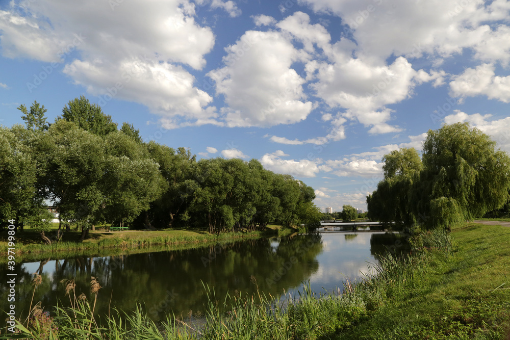 Summer landscape on the banks of the Svisloch River, which flows through the city of Minsk, Belarus