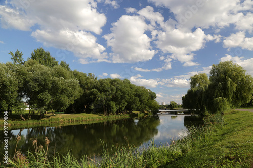 Summer landscape on the banks of the Svisloch River, which flows through the city of Minsk, Belarus