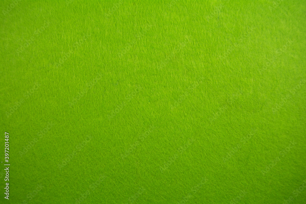 Felt green for the background of your design. Background and texture concept. Felt green for the background of your design. Background and texture concept.