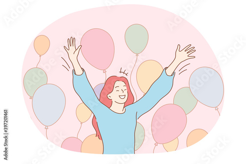 Birthday celebration, holiday, party concept. Young happy woman feeling excited during holiday celebration with colourful balloons at background. Surprise, anniversary, gift, happiness