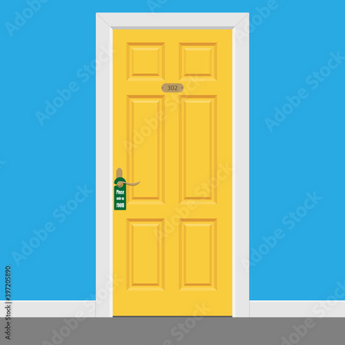 Hotel room yellow closed doors with frame. Please make up room sign.
