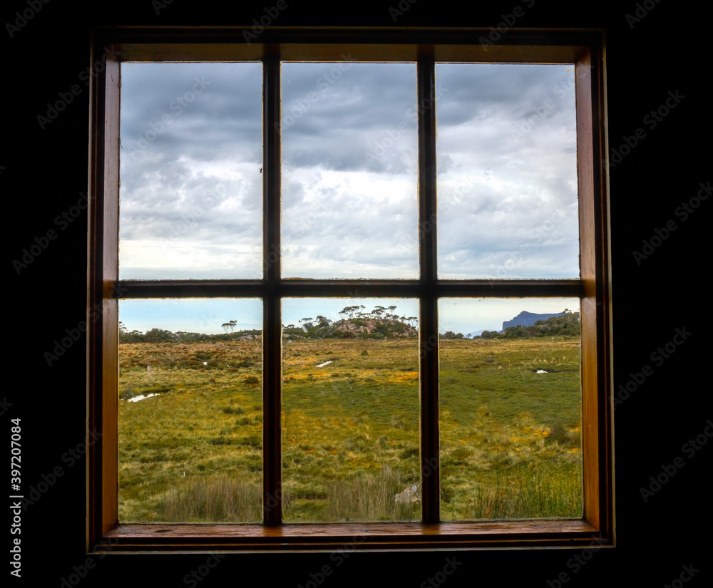 Naklejka premium Dark window bright world