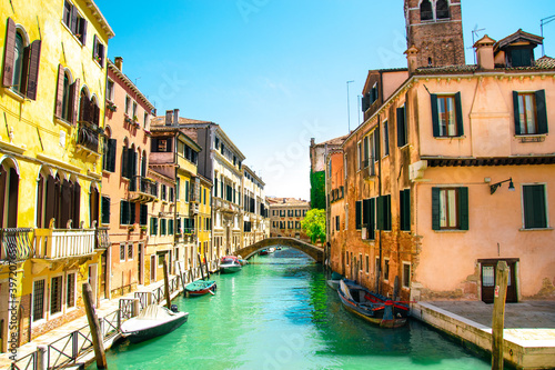 Sunny and beautiful Venice. Old colorful buildings, narrow streets and bridges. Monuments of Venice in Italy  © Katarzyna
