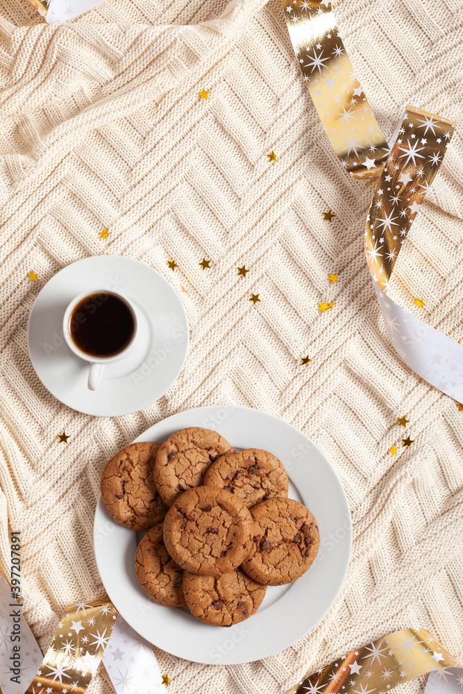 Cup of coffee and cookies on a knitted blanket Cup of coffee and cookies on a knitted blanket