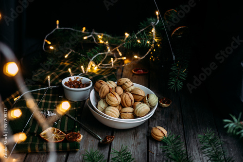 Cookies Nuts with filling on a dark table