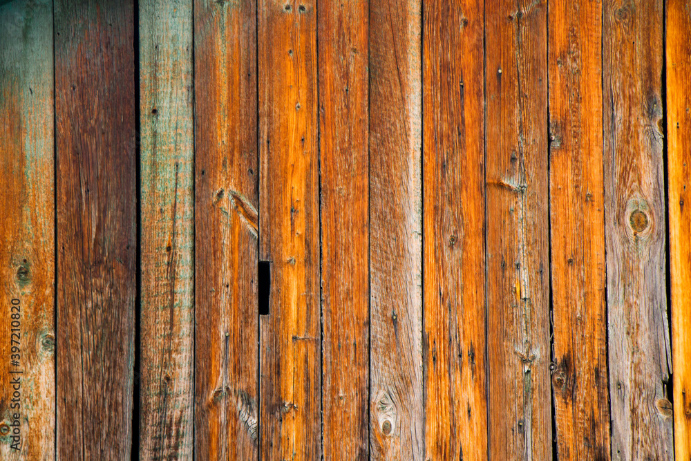 Naklejka premium Wooden material background and texture, pattern of the wooden lines.