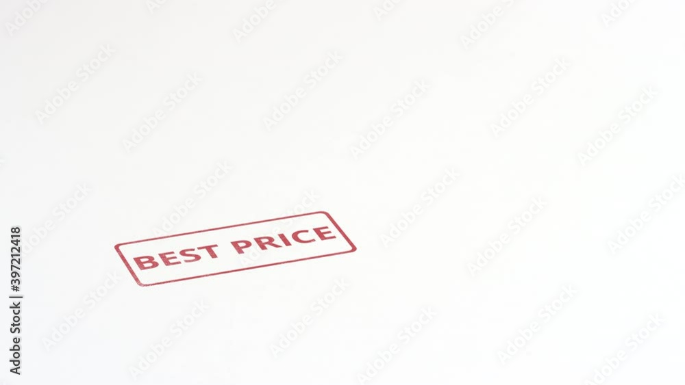 Putting red BEST PRICE rubber stamp on the paper, close-up shot