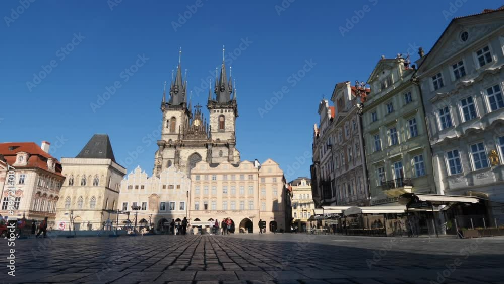 Prague Old Town During Covid-19 Virus Pandemic. Empty Square and Restaurants by Church of Our Lady Before Tyn, Slow Motion Low Angle View on Sunny Day Prague Old Town During Covid-19 Virus Pandemic. Empty Square and Restaurants by Church of Our Lady Before Tyn, Slow Motion Low Angle View on Sunny Day